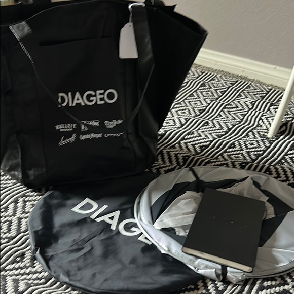 Black reusable tote w storage collapsible storage bag, and notebook